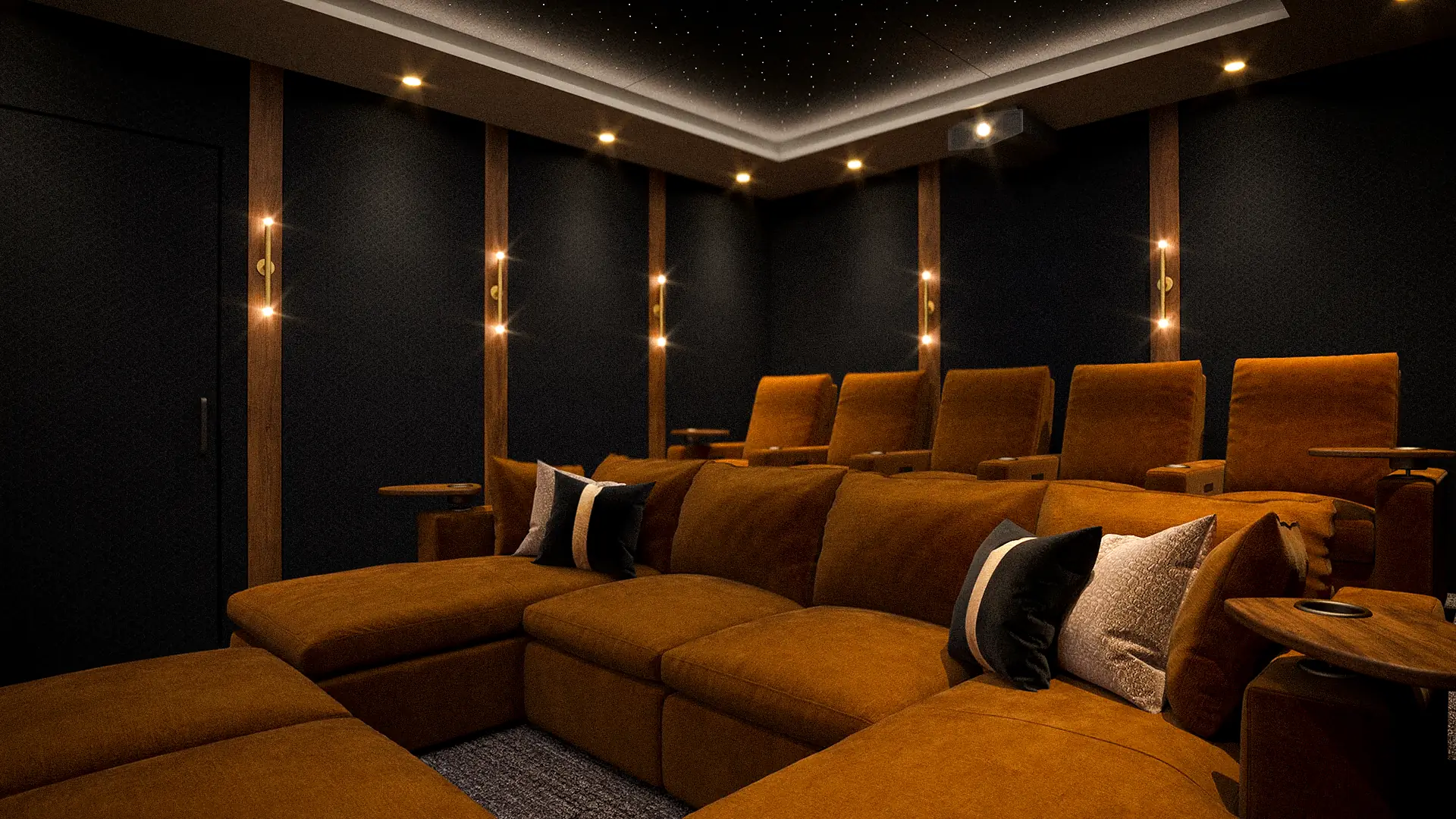 A CinemaTech theater with cove and step lighting dimmed for a film