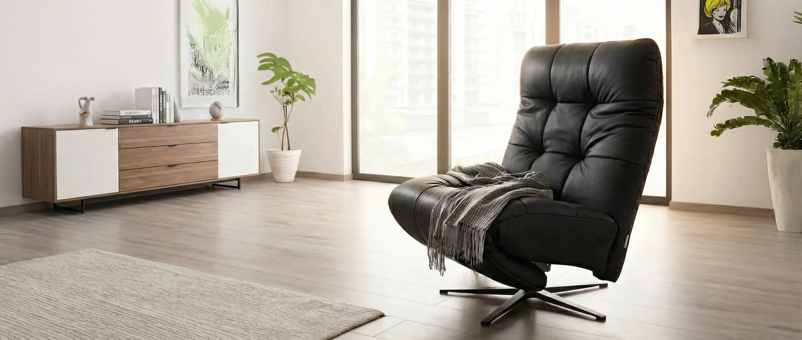 A CinemaTech motorized swivel cinema chair in a bright room