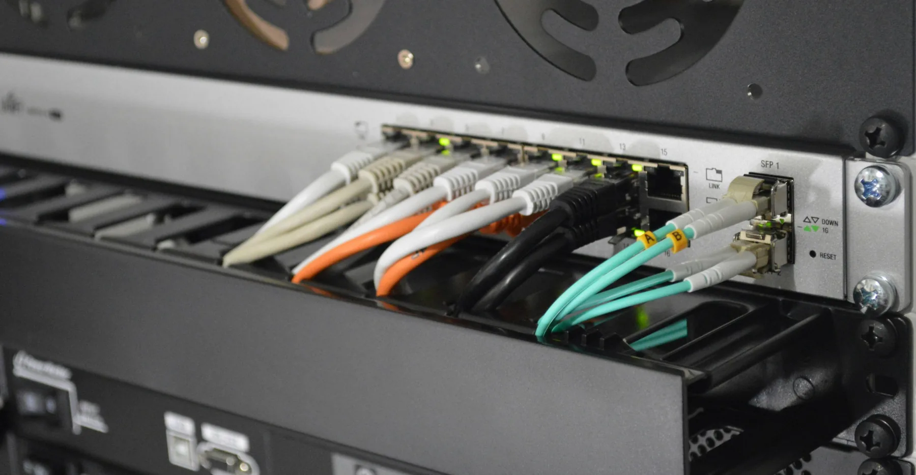 A network switch with labelled patch cables